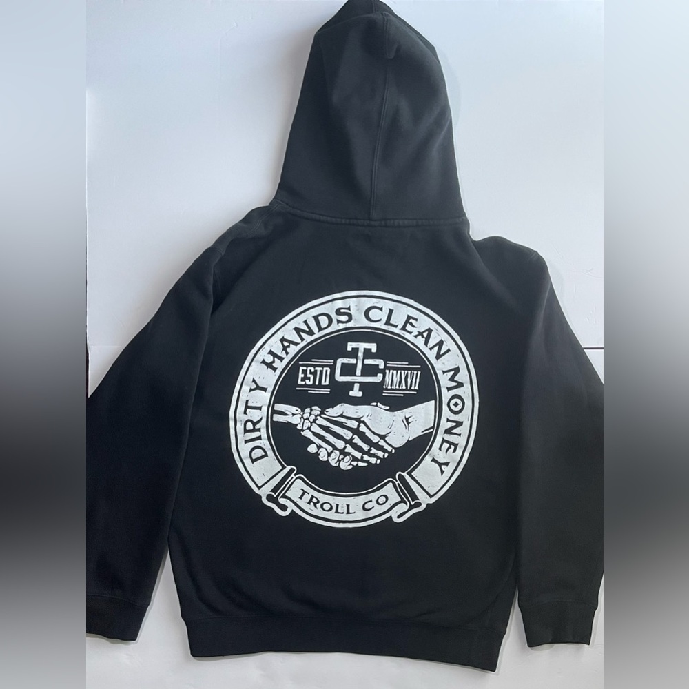 Black and White Sweater with Striking Logo Design